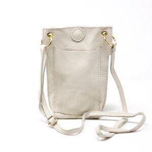 cellphone crossbody bag is made from Italian leather and features a removable